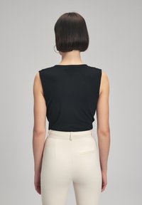 adL WITH SNAP - Blouse - black