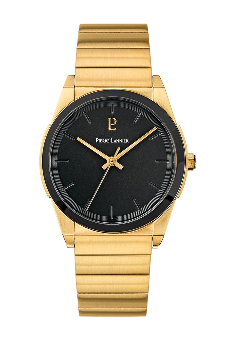 Reloj de metal dorado con correa tipo pulsera, esfera negra, marcadores de hora dorados y manecillas. Cuenta con una caja redonda con bisel negro y logotipo.