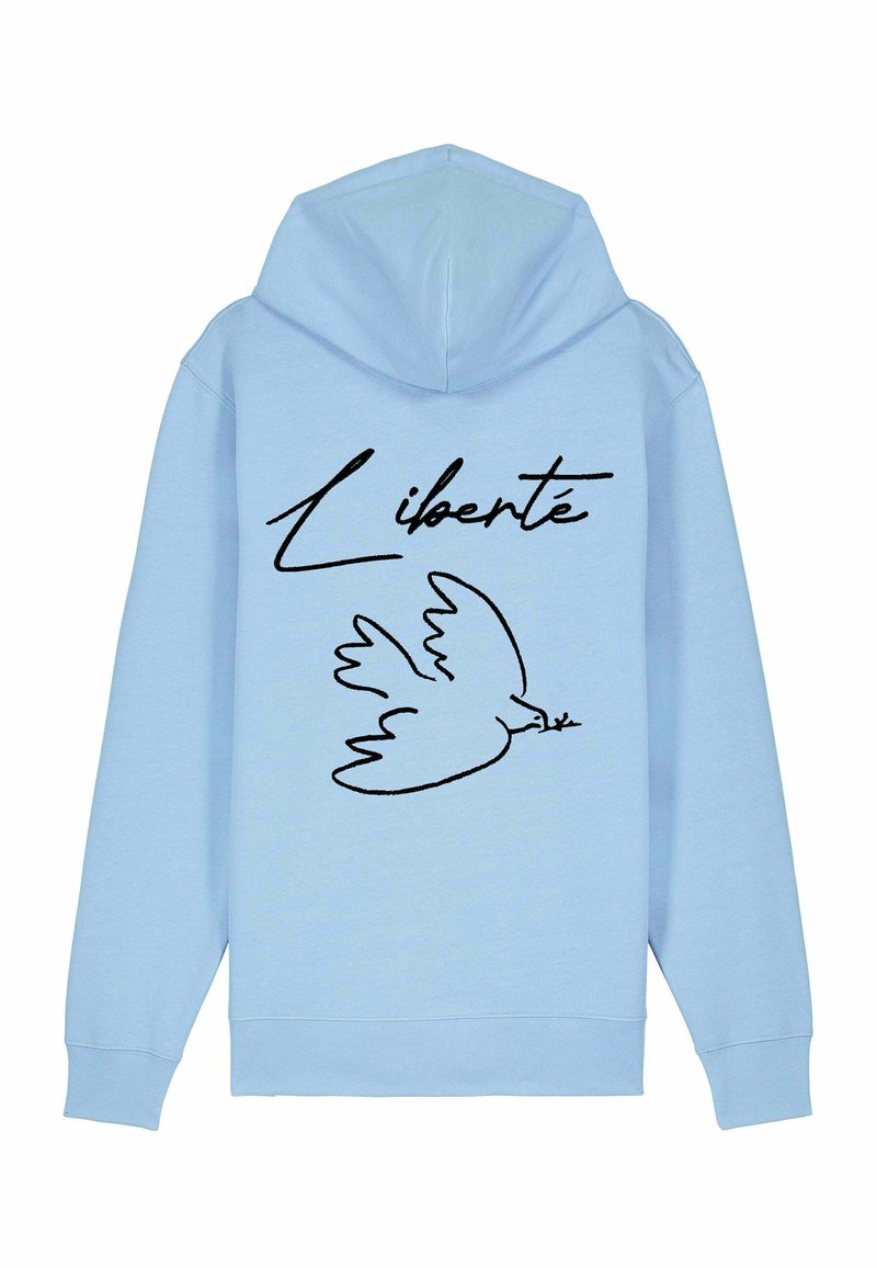Hoodie bleu clair avec une capuche à cordon, présentant un contour noir d'une colombe et le mot « Liberté » en cursive au dos.