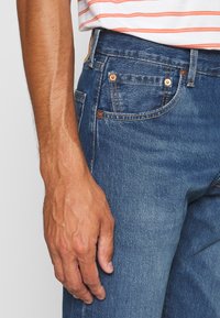 Levi's® 501® 93 CROP - Calças de ganga de perna direita - bleu eyes night