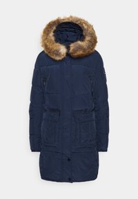 Giacca piumino blu navy con cappuccio foderato in pelliccia sintetica, tasche laterali con zip e chiusura a bottoni. Design trapuntato e tessuto resistente.