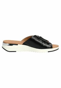Sandali neri senza fibbia con una finitura lucida, caratterizzati da un design a fascia ampia, soletta beige e una suola platform bianca e texturizzata.