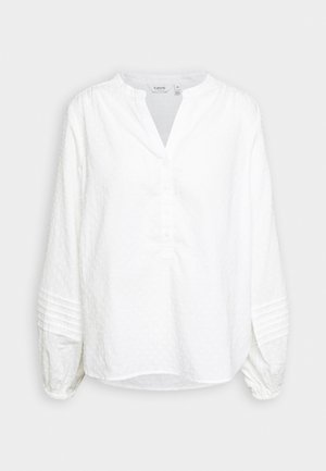 Weißes Langarmbluse mit rundem Ausschnitt und Knopfleiste. Mit strukturierten Punkten und gerafften Ärmeln mit gefältelten Akzenten.