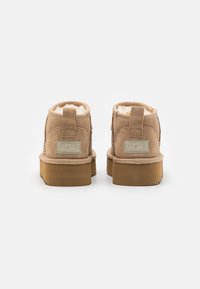 UGG CLASSIC ULTRA MINI UNISEX - Classic ankle boots - sand