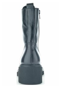 Černá kožená kotníková bota s hladkým povrchem, šitými detaily a blokovým podpatkem. Boční zip pro snadné obouvání.