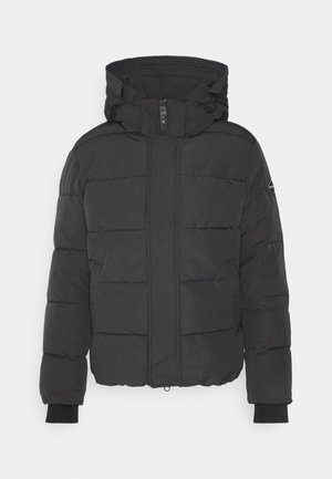 Black puffer jacket with a hood, featuring a front zipper, ribbed cuffs, and stitched panels for insulation. Simple, functional design.