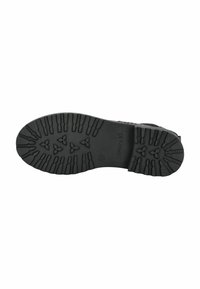 Suela de goma negra con patrones de taco profundos, que presenta una superficie texturizada y detalles de marca. Diseñada para brindar agarre y durabilidad.