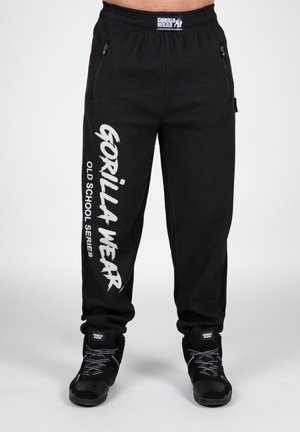 AUGUSTINE - Pantalon classique - black