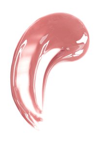 Glanzende, gebogen streep lichtroze crème of gel met een gladde textuur op een witte achtergrond.