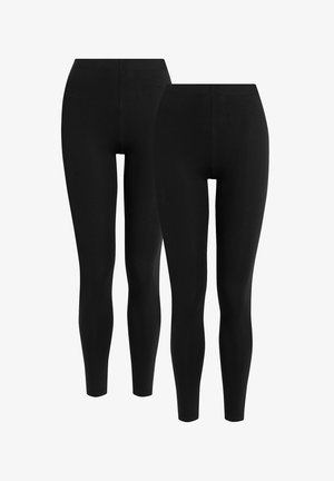 Mustad retuusid siledast, elastsetest kangast. Omavad kõrget vöökohta ja keha lähedast lõiget. Saadaval on kahe suuruse valik.