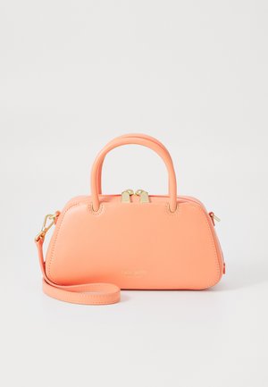 Peach-colored structured handbag with dual top handles and a detachable shoulder strap. Features gold hardware and a smooth leather texture.