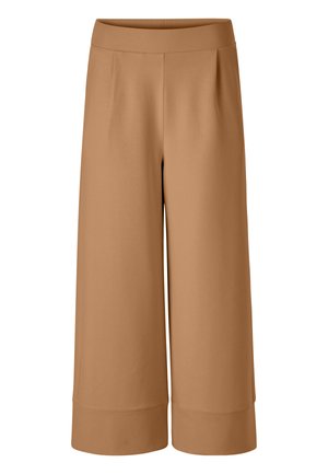 Platas bikses ar augstu vidukli un plašām kājām, gaisīgi brūnā krāsā, ar gludu jostasvietu un smalkām priekšējām krokām.