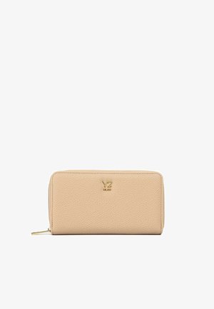 Portafoglio beige in pelle con zip a giro, logo Y? dorato e cursore della zip, forma rettangolare, design minimale.