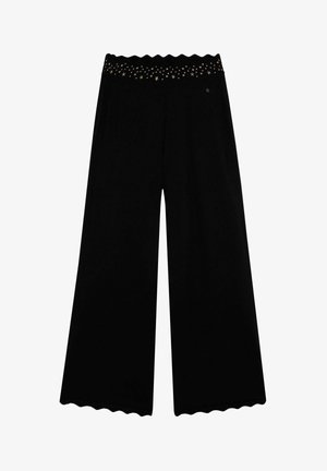 Black wide-leg pants with a scalloped waistband featuring gold star embellishments. Made from a soft, stretchy material.