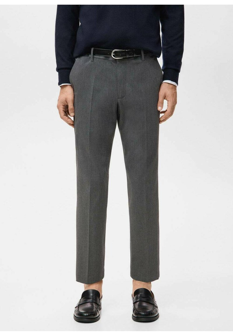 Gray tailored trousers made of a soft fabric, featuring a straight cut, pressed pleats, and belt loops, paired with black loafers.