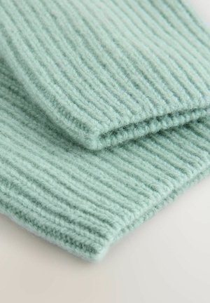 Weiches, mintgrünes Strickgewebe mit gerippter Textur, sichtbaren Fasern und einer glatten Kante. Zwei übereinander liegende Abschnitte.