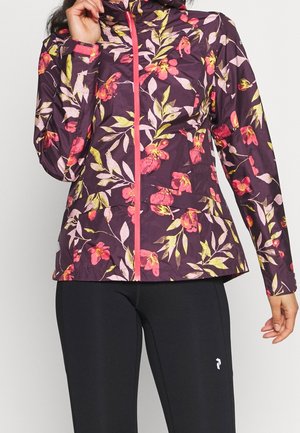 Blommig jacka i mörklila med rosa och gula blommönster; tillverkad av lätt material med dragkedja fram och en figurnära passform.