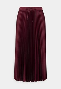 Gonna plissettata bordeaux realizzata in tessuto liscio. Vita elastica con cordoncino. Arriva a metà polpaccio, mettendo in mostra delle pieghe verticali uniformi.
