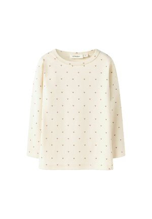 Haut à manches longues crème clair avec un motif de cœur en rose et marron. Fabriqué dans un tissu doux et extensible avec un col rond.