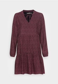 Bordeaux klänning med långa ärmar, en V-ringning och en knyt detalj. Har en delad kjol och ett litet blommönster genom hela tyget.