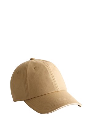 Gorra de béisbol de algodón beige con visera curvada y diseño de paneles cosidos sobre fondo blanco.