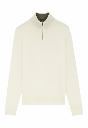 Pull couleur crème avec un col montant et une fermeture à demi-fermeture éclair. Fabriqué en tissu doux, avec des poignets et un ourlet côtelés pour un look ajusté.