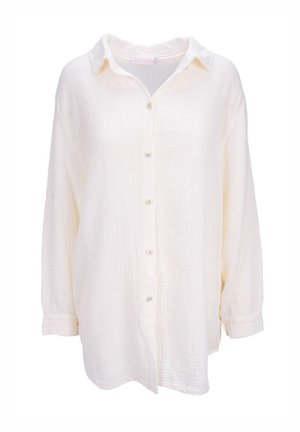 Weißes Hemd mit strukturierter Stoffoberfläche, ausgestattet mit einem Kragen, langen Ärmeln und Knöpfen an der Vorderseite.