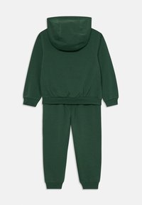 Nike Sportswear CLUB UNISEX SET - Trenirka - dark green