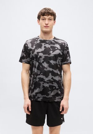 TAD ESSENTIALS TEE - Športové tričko - black