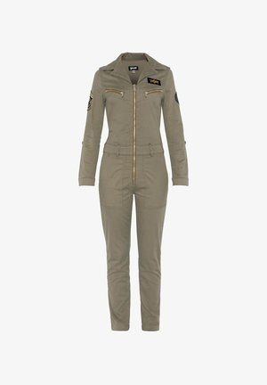 Giubbotto khaki realizzato in tessuto misto cotone. Presenta una chiusura con zip frontale, maniche lunghe e due tasche sul petto con toppe ricamate.