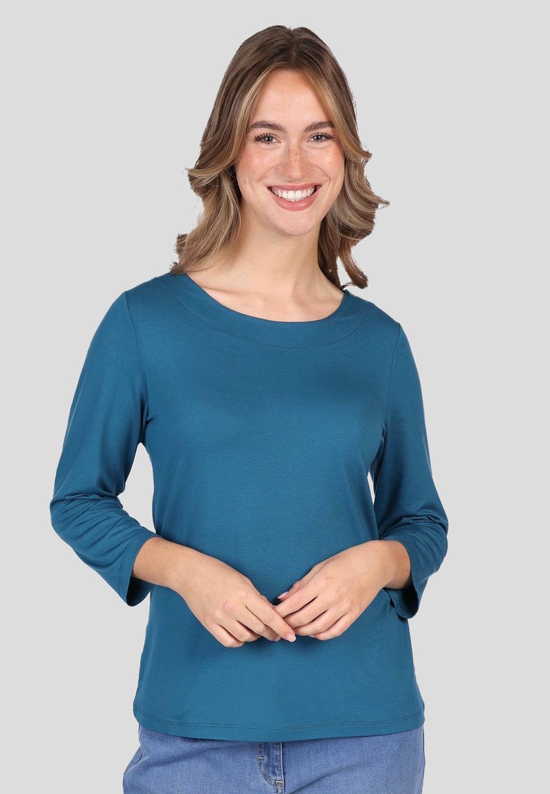 Teal Langarmshirt mit Bootsauschnitt, aus glattem Stoff gefertigt. Verfügt über Dreiviertelärmel und einen lockeren Schnitt.