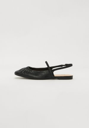 Black leather slingback flat shoes with a pointed toe and gathered detail at the front. Flat sole and adjustable strap at the heel.