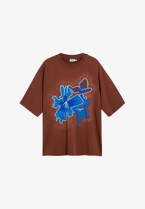 Bruine katoenen t-shirt met een opvallend blauw abstract grafisch ontwerp met textuuraccenten en een losse pasvorm.