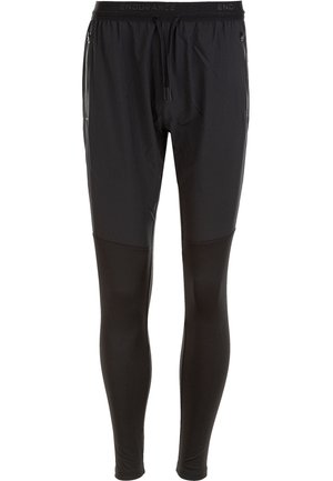 Mustat urheiluhousut, joissa on slim fit -malli, tekstuurinen yläosa ja sileät alavartalot, joustava vyötärö ja säädettävä nyöri.