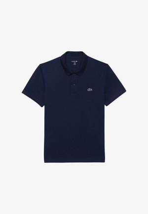 Dunkelblaues Polohemd aus Baumwolle; verfügt über einen klassischen Kragen, kurze Ärmel und ein kleines, weiß gesticktes Logo auf der linken Brust.