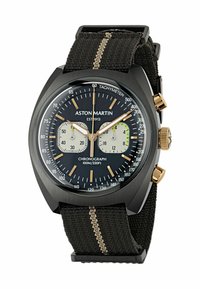 Orologio cronografo nero con cassa nera opaca, dettagli dorati, cinturino in tessuto nero con una striscia beige e quadrante multifunzionale.
