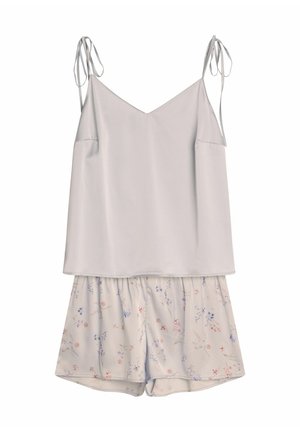 Helle graue Satin-Camisole mit dünnen verstellbaren Trägern, kombiniert mit Shorts im Blumenmuster in sanften Pastellfarben. Legere Passform.
