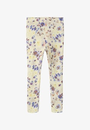 Leggings pour enfants de couleur crème avec un motif floral délicat en nuances de bleu, jaune et marron, présentés à plat sur un fond blanc.