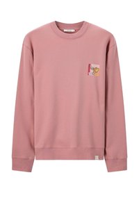 Sweatshirt long à manches en rose poussiéreux avec col rond et petit patch en art linéaire abstrait sur la zone du poignet gauche.