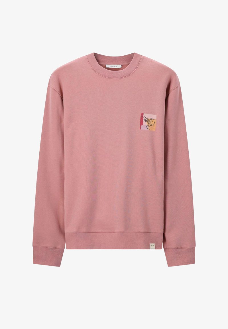 Sweatshirt long à manches en rose poussiéreux avec col rond et petit patch en art linéaire abstrait sur la zone du poignet gauche.