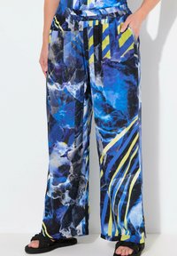 Blauwe en zwarte patterned wijde broek met gele strepen, elastische tailleband en zijzakken. Gestructureerde stof met een vloeiende val.