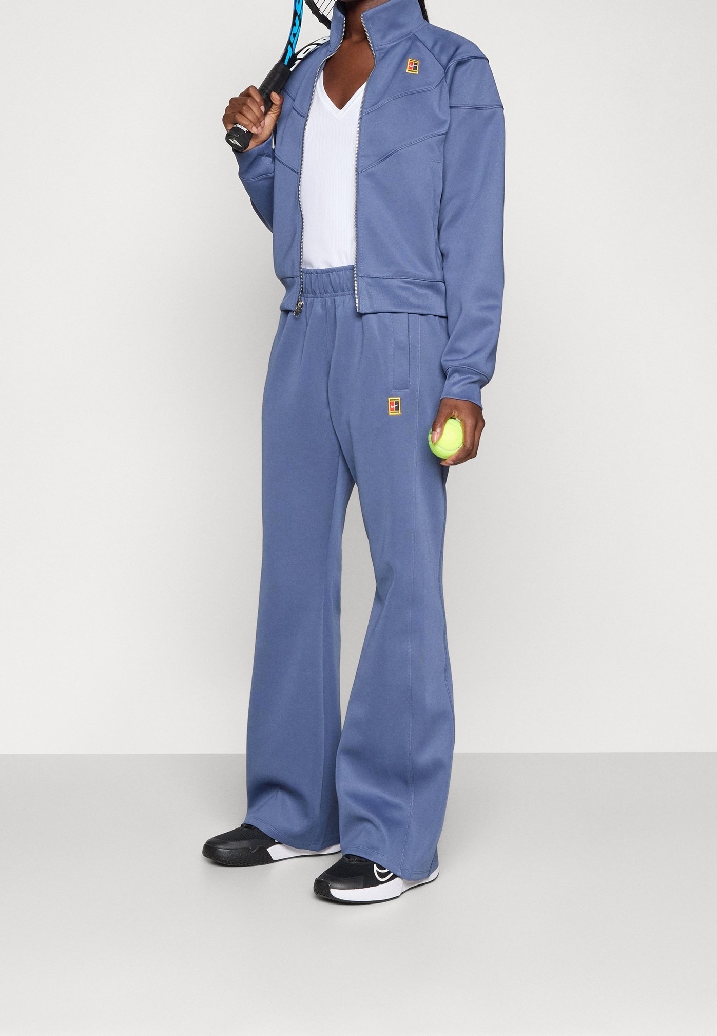 nike tennis pants with ball pocket