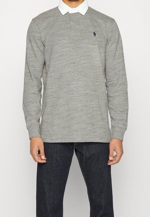 Gray long-sleeve polo shirt with a white collar, featuring a small navy logo on the chest and a textured fabric design.