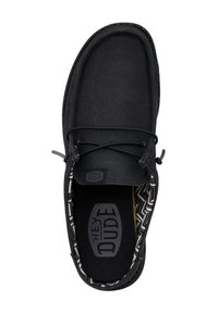 Scarpa in tessuto nero con punta arrotondata, design minimalista, chiusura con lacci e fodera a motivo contrastante. Logo visibile sulla soletta.