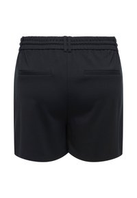 Short noir avec taille élastique, deux poches passepoilées horizontales à l'arrière et passants de ceinture, vus de dos.
