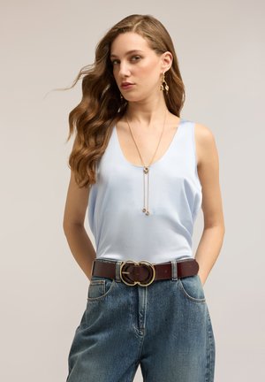 A SPALLA LARGA - Bluse - azzurro