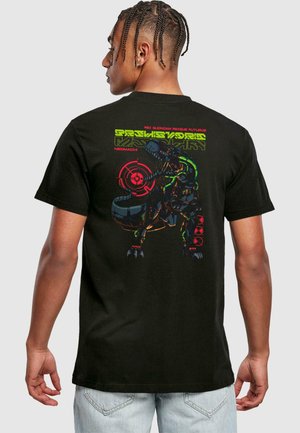 Black t-shirt featuring a colorful graphic of a dinosaur robot, with neon accents and intricate details on the back, made from cotton.