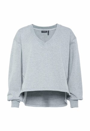 Light gray, cropped sweatshirt with a V-neck and drop shoulder design. Soft texture with ribbed cuffs and hem, featuring side slits.