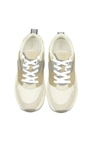 Beige and gray sneakers with mesh and suede textures, white laces, and a rear pull tab featuring a striped design. Lightweight sole.