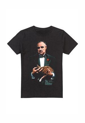 Schwarzes Baumwoll-T-Shirt mit einem Frontmotiv eines Mannes im Smoking, der eine orangefarbene Hauskatze hält, mit dem Aufdruck "Der Pate" darunter.